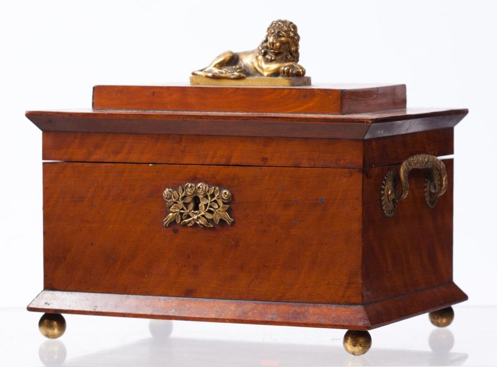 Maple Jewelry Box with Ormolu Mounts: Surmounted by a recumbent lion. 7 x 8 1/2 x 6 inches.