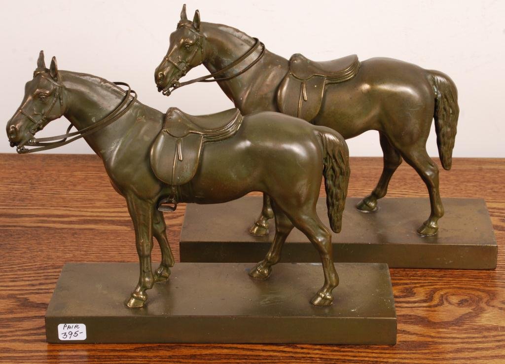 Pair of Cast Metal Tacked Horse Bookends: Unmarked patinated white metal. 8 x 10 x 3 inches.