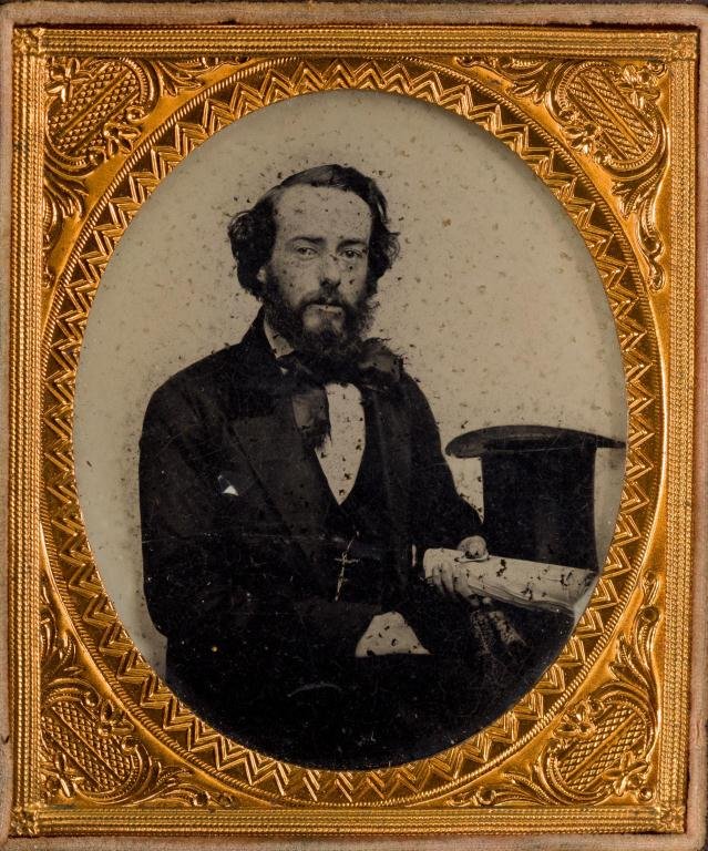 Holmes, Booth & Haydens 1/6 Plate Ambrotype: Man with top hat holds rolled papers.