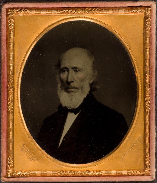 1/6 Plate Ambrotype of Gentleman by George Barnard: Sitter unknown. Tinted cheeks, mat stamped Barnard and Cutting's Patent .
