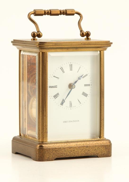 MATTHEO NORMAN CARRIAGE CLOCK SWISS MADE: "Smithsonian" 1 1/2 inch dial. 5 1/2 x 3 x 2 /12 (including handle)