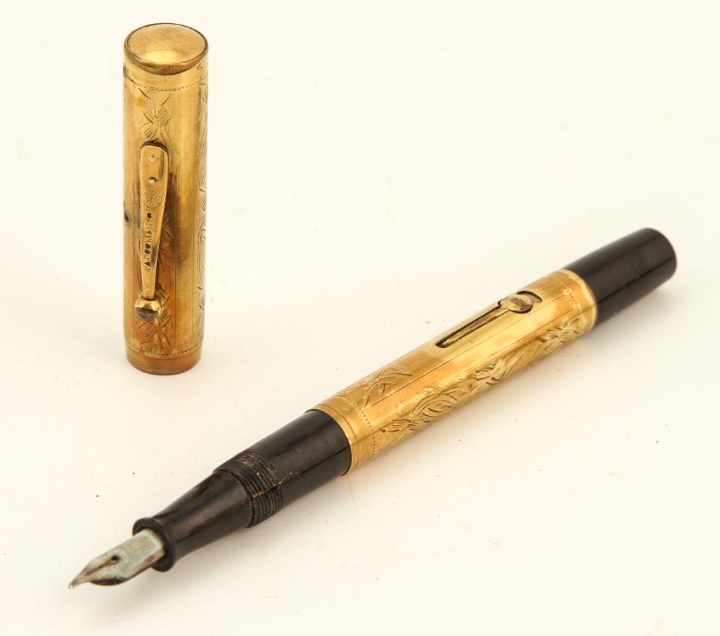 WATERMAN'S GOLD FILLED FOUNTAIN PEN CIRCA 1927: Engraved P.E. to L.E. 1927. Together with box. Length 5 1/2 inches.