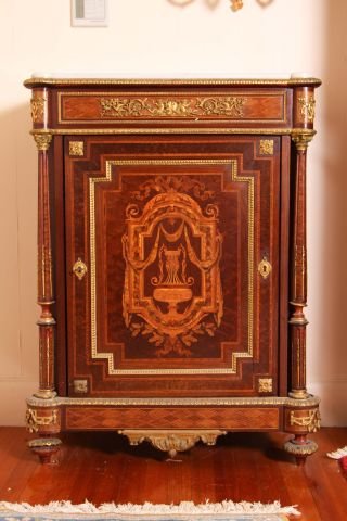 19th c Louis XVI Sideboard: marquetry and parquetry inlay with ormolu mounts and marble top. ATT: Sormani. 44"hx33"wx17"d