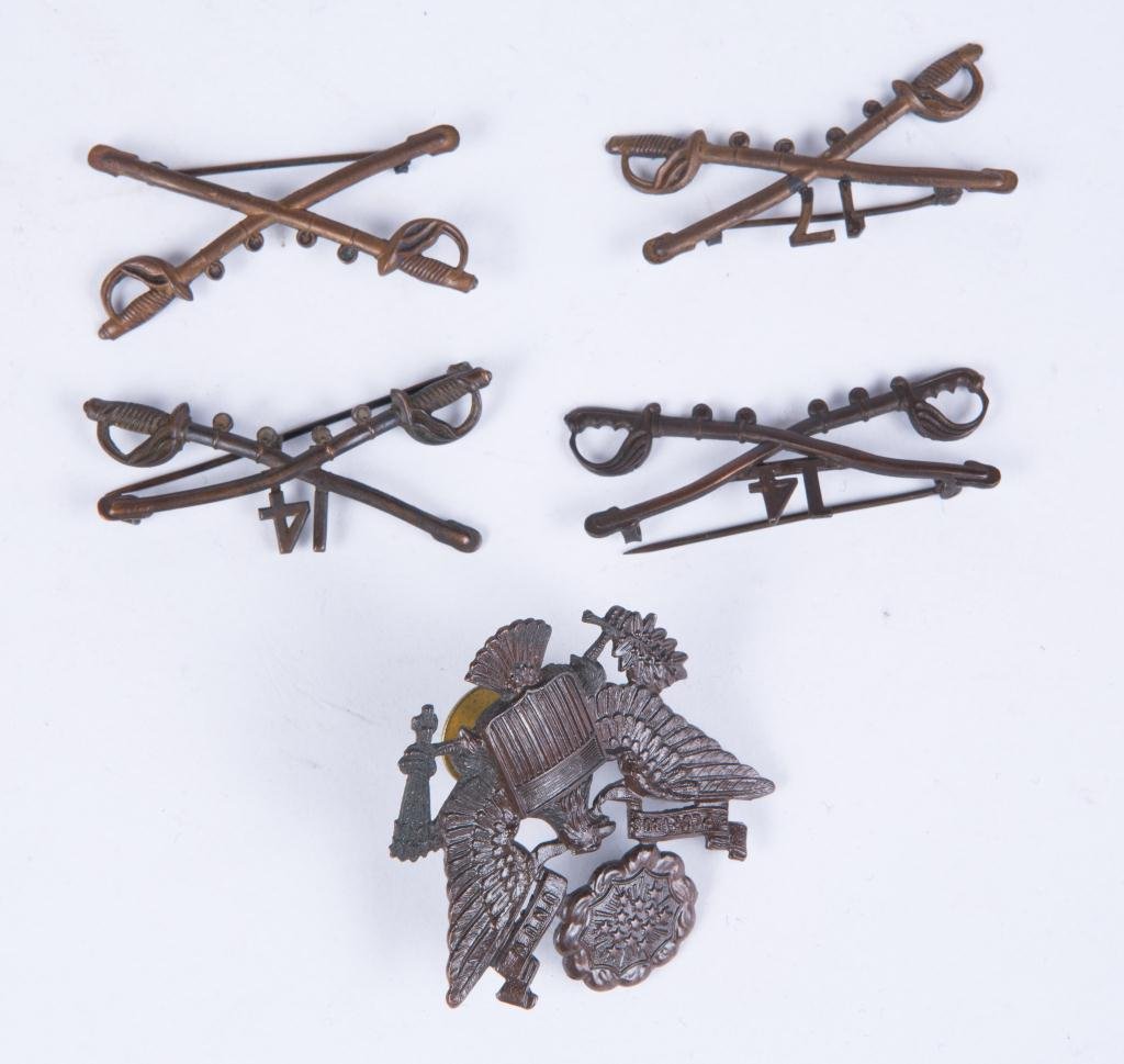 (4) CAVALRY COLLAR INSIGNIAS AND HAT BADGE: (2) 14th, (1) 17th and (1) unmarked.