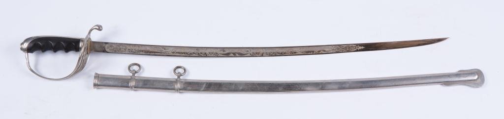 HARDING UNIFORM & REGALIA CAVALRY SWORD c.1900: Signed in ricasso, 29 inch blade etched with foliates, armor and flags. 35 inches (overall). Together with its original scabbard