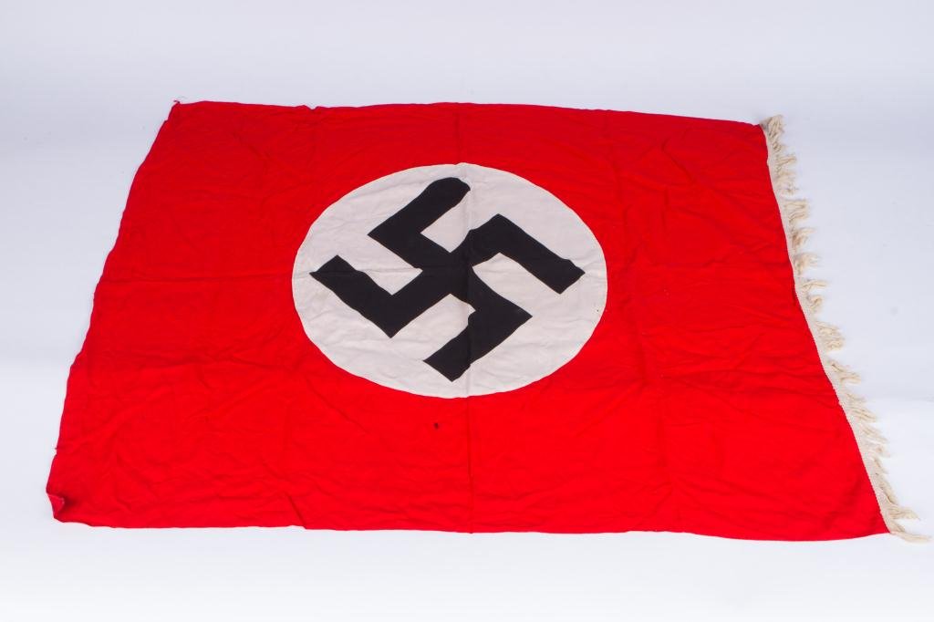 NAZI FLAG (OR BANNER) with FRINGE: Round white cotton printed with black swastika is sewn onto red field. (one sided). 30 x 36 inches