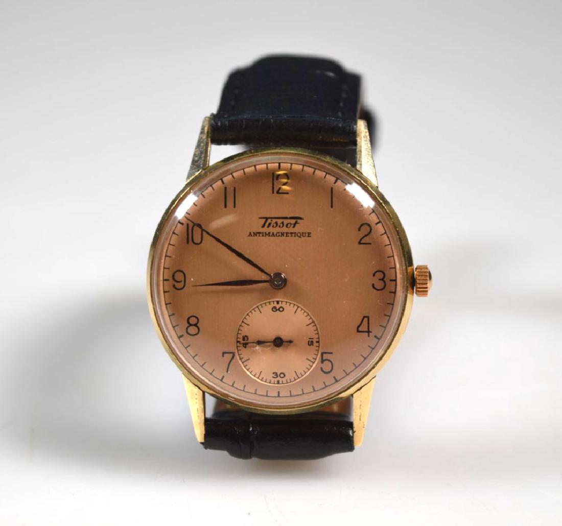 14K Yellow Gold "Tissot Antimagnetic" Wristwatch: 14K Yellow Gold "Tissot Antimagnetic" Wristwatch, the back of case marked Tissot and 585 - 14K; brushed rose gold face with second hand dial; leather strap. Appears to be in working order, but we cann
