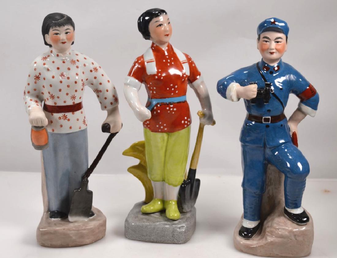 3 Chinese Cultural Revolution Porcelain Figures: 3 Chinese Cultural Revolution Porcelain Figures, a Police Officer with binoculars, a Train Switch operator with a Red Lantern and a Lady Worker with a Shovel. Light wear. Height 11 1/4 inches (28.5 cm