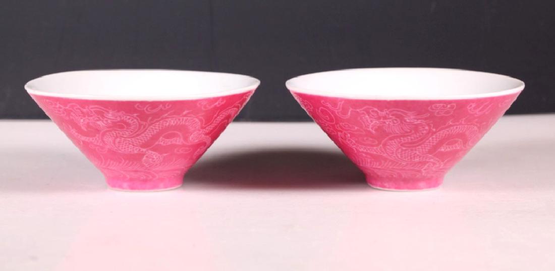Pr Chinese Sgraffito Incised Rose Porcelain Bowls: Pair Chinese Sgraffito Incised Rose Enameled White Porcelain Bowls, the enamel with Dragons chasing Flaming Pearls, The bases with underglaze blue Yongzheng Marks. Very light age related wear. Diamete