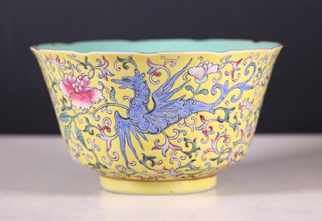 Chinese 19 C Famille Rose on Yellow Porcelain Bowl: Chinese 19 century Famille Rose on Yellow enameled background Porcelain Bowl with three archaic flying Dragons with flowers, the inside and base in turquoise enamels with a 6 character mark in iron re