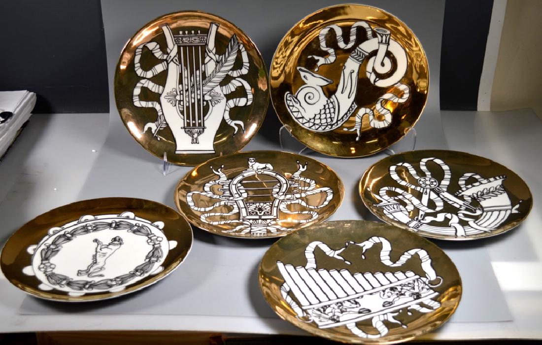 6 Fornasetti "Musicalia" 10 Inch Porcelain Plates: 6 Fornasetti - Milano "Musicalia" Plates; Black and Gold on German Arzberg Porcelain, 4 with "Arzberg Made in Germany" mark in green over-stamped with Hand & Brush logo "Fornasetti - Milano Made in It