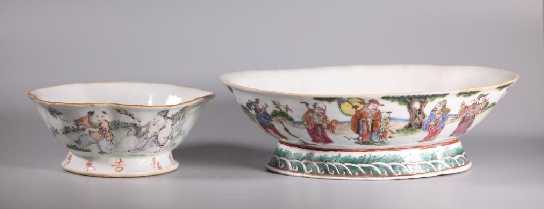 2 Chinese 19 C Enameled Porcelain Shaped Bowls: 2 Chinese 19 Century Enameled Porcelain Shaped Bowls on high feet.; the first a quatrefoil oval bowl well painted with Immortals meeting in a garden, the base with green waves and spray, base in clear