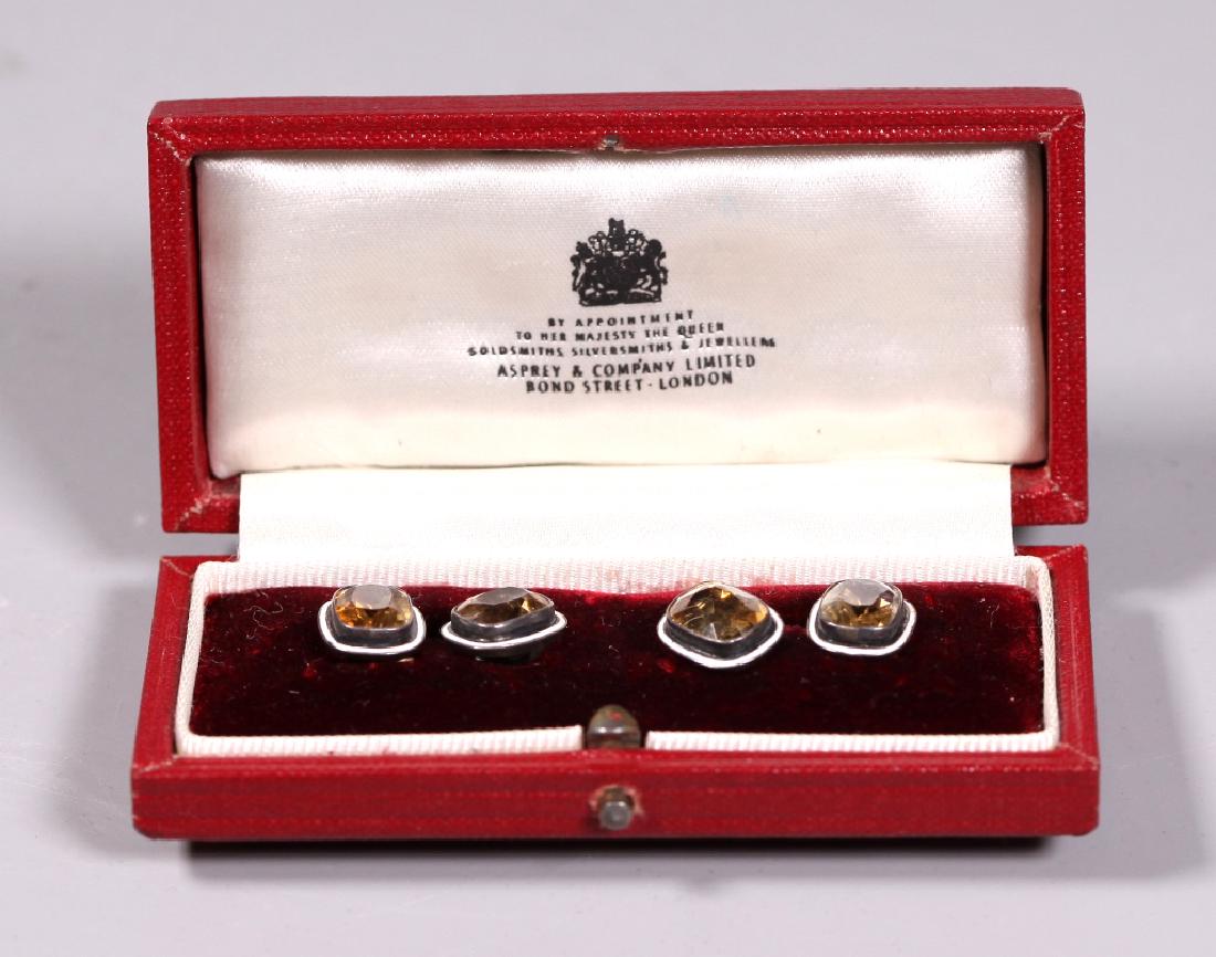 Asprey & Co. Edwardian Men's Dress Cufflinks: Asprey & Co. Edwardian Men's Dress Cufflinks, with 4 cushion cut topaz in sterling and white enamel settings, the bar links marked "935" (a standard in 19 century Austria, Germany, and Switzerland). I