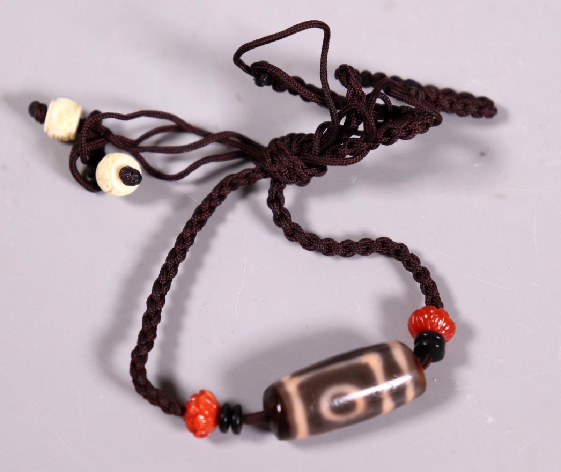 Antique Tibetan Dzi Bead on Black Cord (1 of 6)