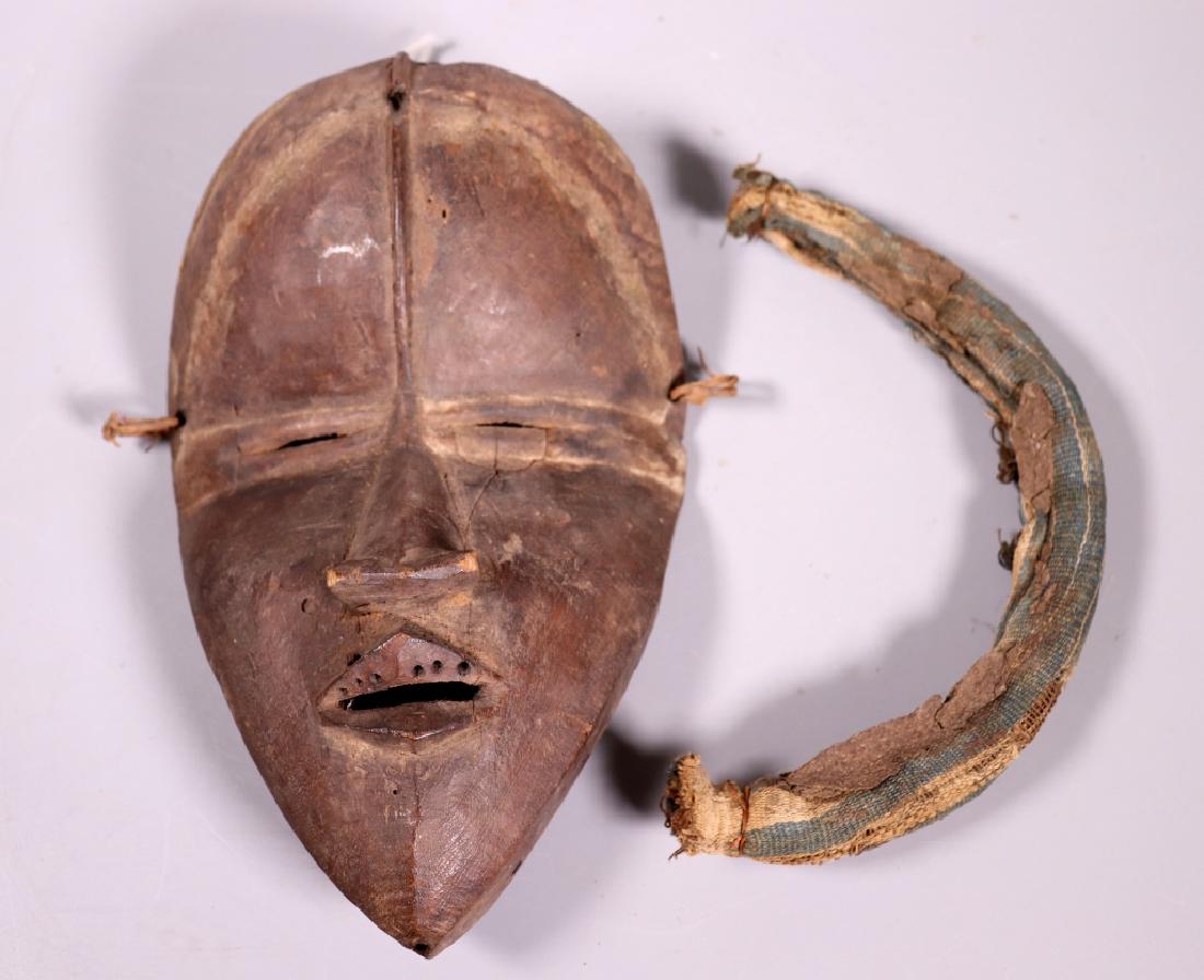 African Carved Wood Mask; Rolled Fabric Headpiece (1 of 5)