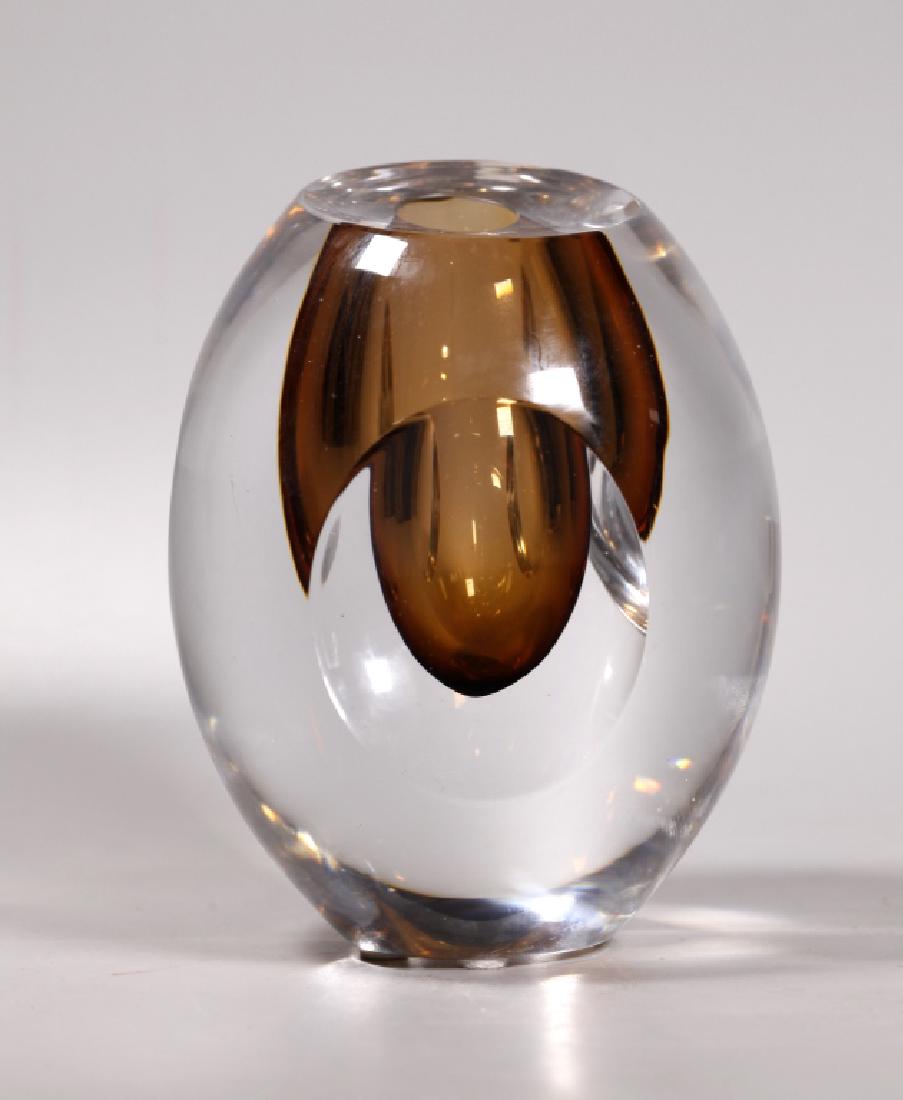 Mona Morales Schildt Kosta Sweden Glass Vase: Mona Morales Schildt (Swedish, 1908-1999); Design for Kosta, Sweden, "Ventana" vase in amber blown glass encased in clear cut & polished glass, 1960's and engraved "Kosta SS279" to base. Two small nib