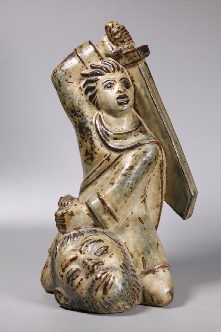 Jais Nielsen; David & Goliath Royal Copenhagen: Jais Nielsen (Danish, 1885–1961); for Royal Copenhagen; "David and Goliath" stoneware figure in brown and cream Sung (Song Dynasty) glaze, circa 1951, incised "0276" Blue painted "Jais" and three wa