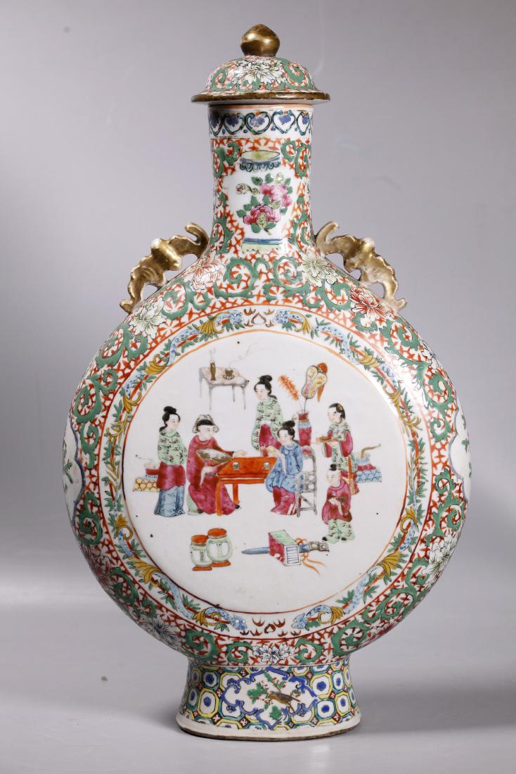 Chinese 19 C Famille Rose Porcelain Moon Flask: Chinese 19 C Famille Rose Enameled Porcelain Moon Flask on high foot with Gilded Bat handles to shoulders and a cover; the front with a design of figures in an interior, the reverse with flowers and b