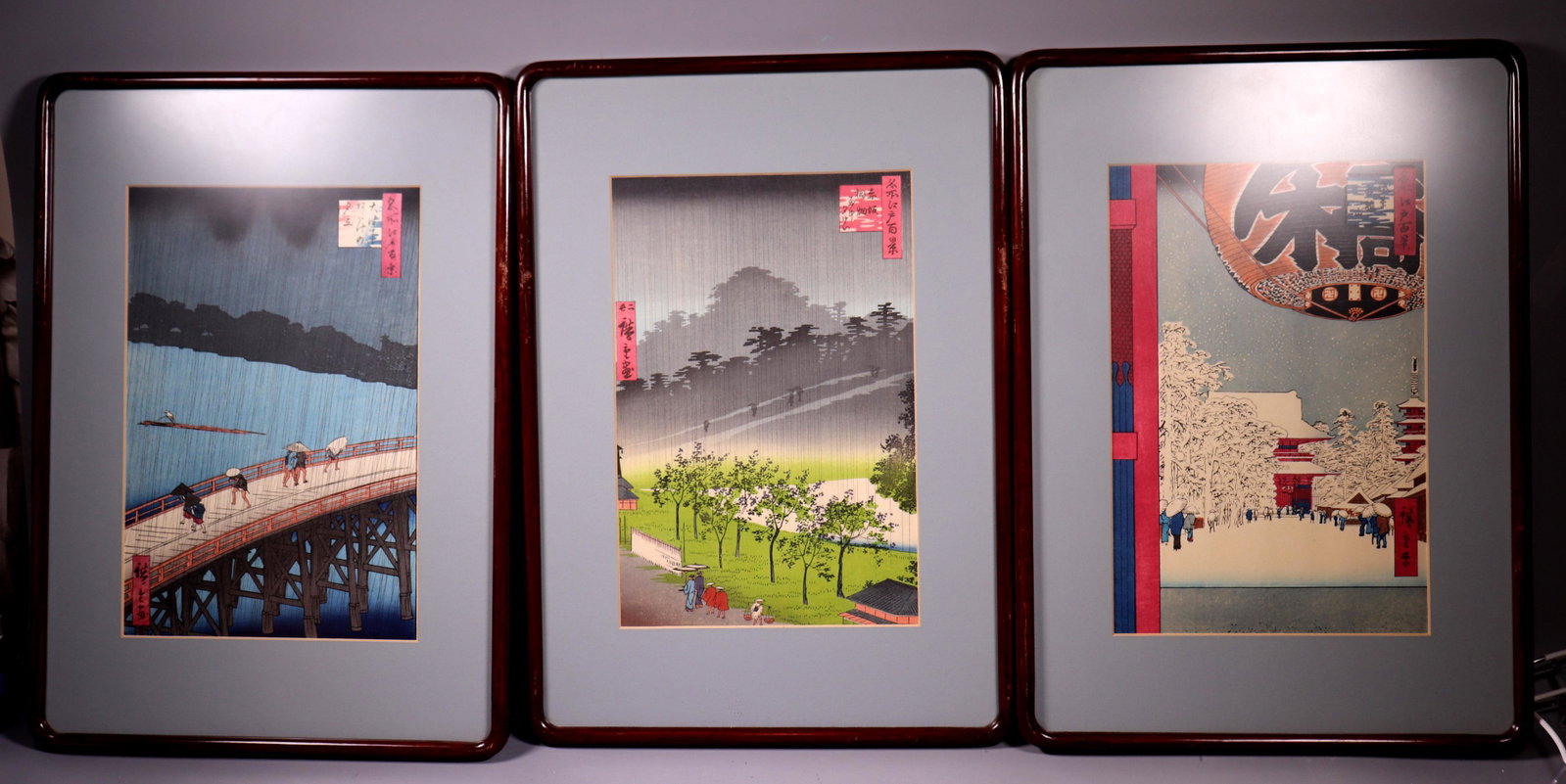 3 Japanese Woodblock Prints Hiroshige "100 Views": 3 Japanese Woodblock Prints by Ando Hiroshige from the series: "100 Views of Edo". Prints are "Ohashi in Rain," "Kinryuzan Temple at Asakusa," and "Paulownia Garden at Akasaka" each matted and framed 