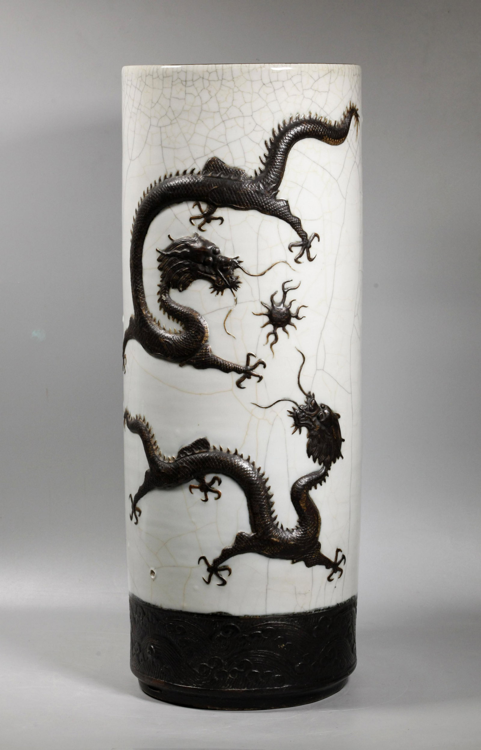 Chinese 19 C Dragon Porcelain Umbrella Stand: Chinese 19 Century Double 4-Claw Dragon & flaming pearl on Crackle Porcelain Umbrella Stand (possibly originally an arrow quiver), the reverse with Crane & Rock, the animals unglazed and covered with 