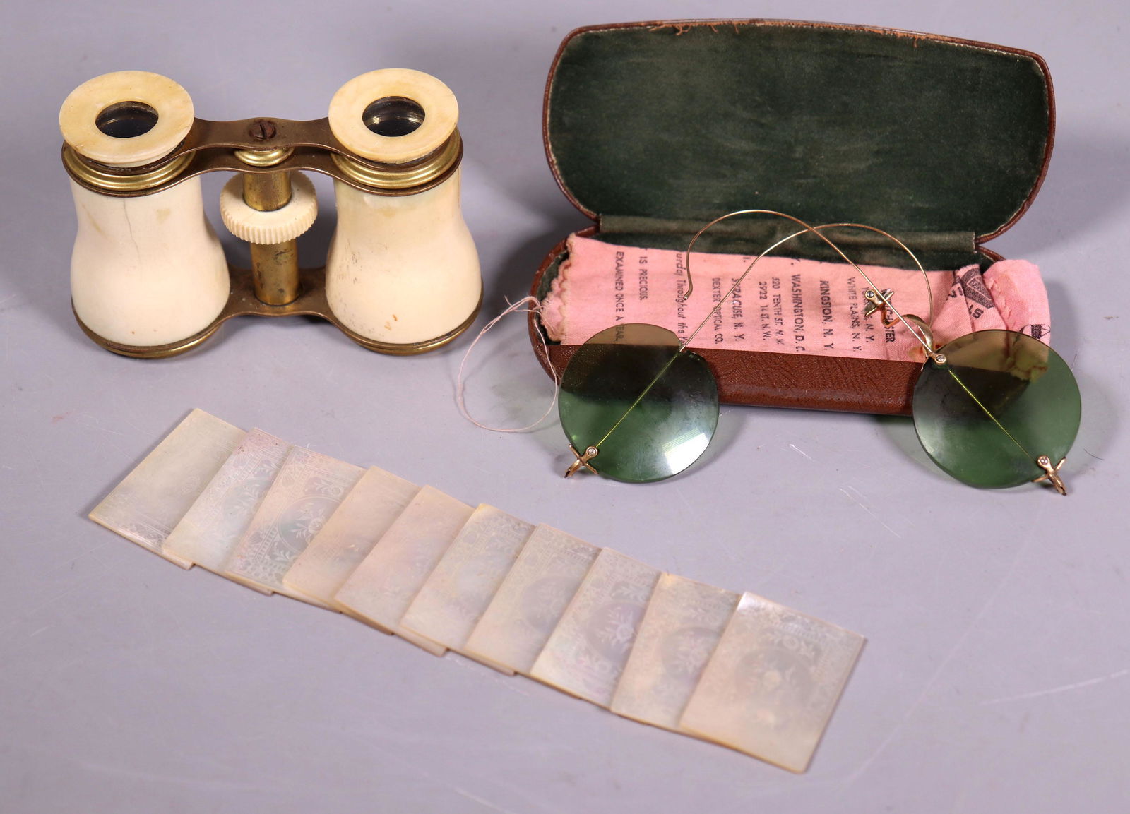 10 Chinese 19 C Carved Pearl Game Chips, 2 Glasses: 10 Chinese Early 19 Century Carved Pearl Rectangular Game Chips incised to both sides with round centers with figures or flowers and floral borders, together with 2 Glasses, a pair of Opera binoculars