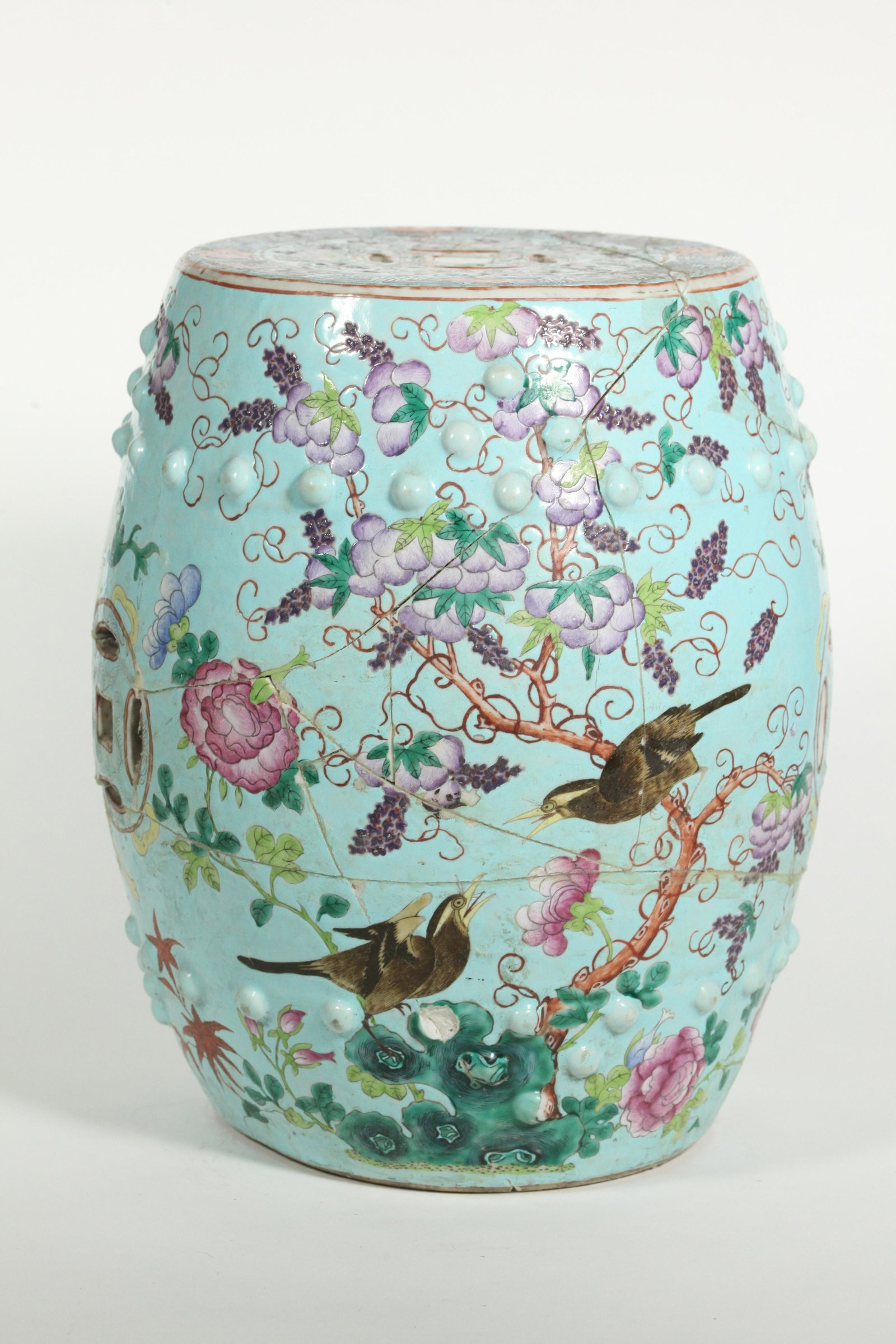 Chinese Qing Turquoise Da Ya Zhai Garden Seat: Chinese Late Qing Dynasty Turquoise Da Ya Zhai Porcelain Garden Seat with Birds and Wisteria Vines; cash-coin holes to top and sides for carrying. Height 12 1/4inches ( 31cm.).