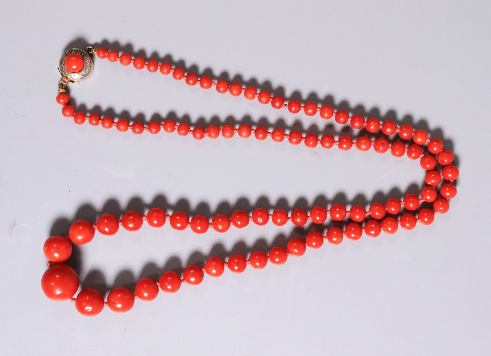Antique Natural Ox Blood Coral Bead Necklace: Antique Natural Ox Blood Coral Bead Necklace. Total weight 26.1 grams. Length 22 1/2 inches (57.1 cm.).