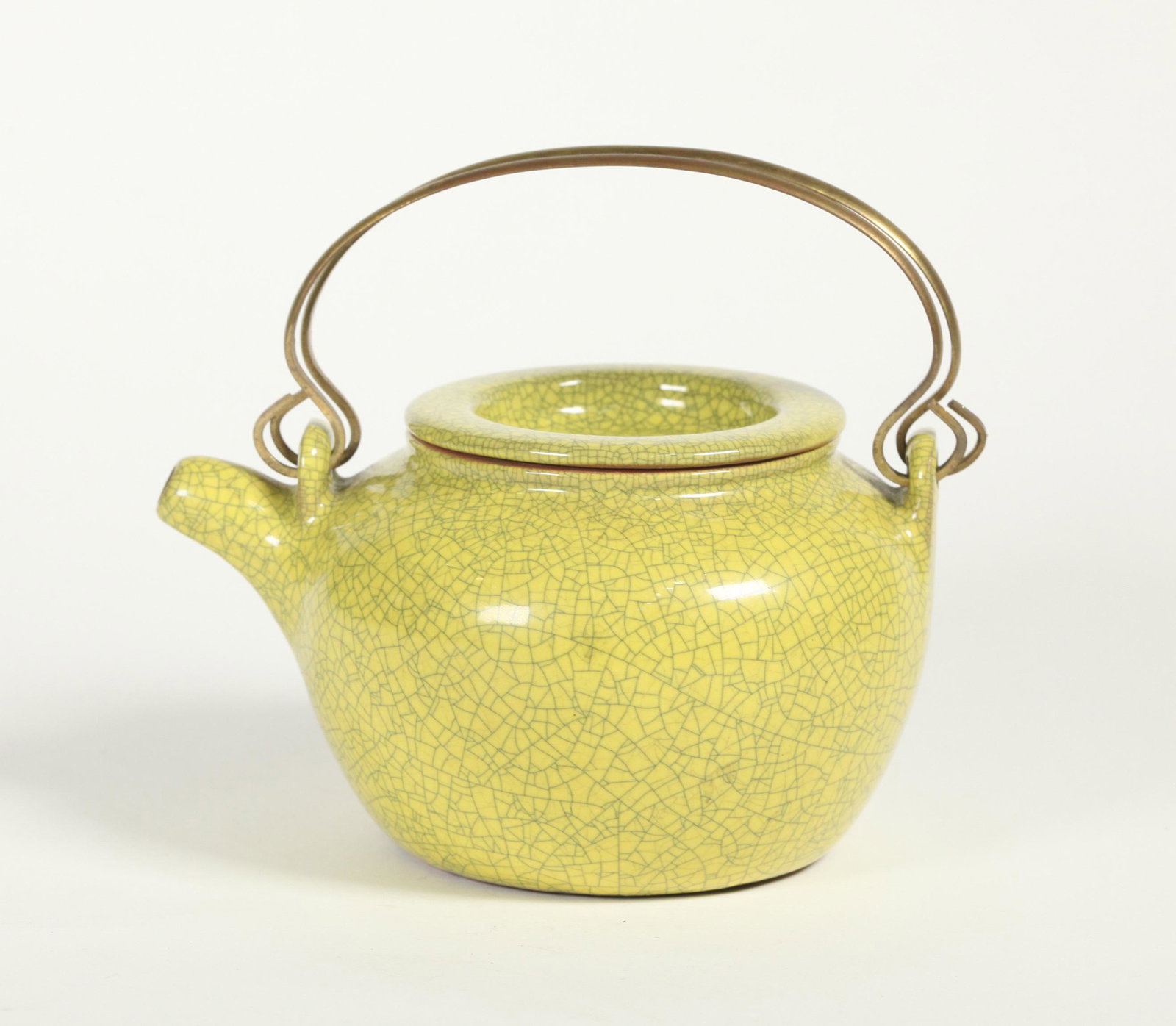 Chinese Yixing Teapot Lemon Yellow Crackle Glaze: Chinese Yixing Teapot with Lemon Yellow Crackle Glaze, inside, base with seal mark and a small square to top of cover with seal mark left unglazed; 2 tabs above spout and opposite with holes now with 