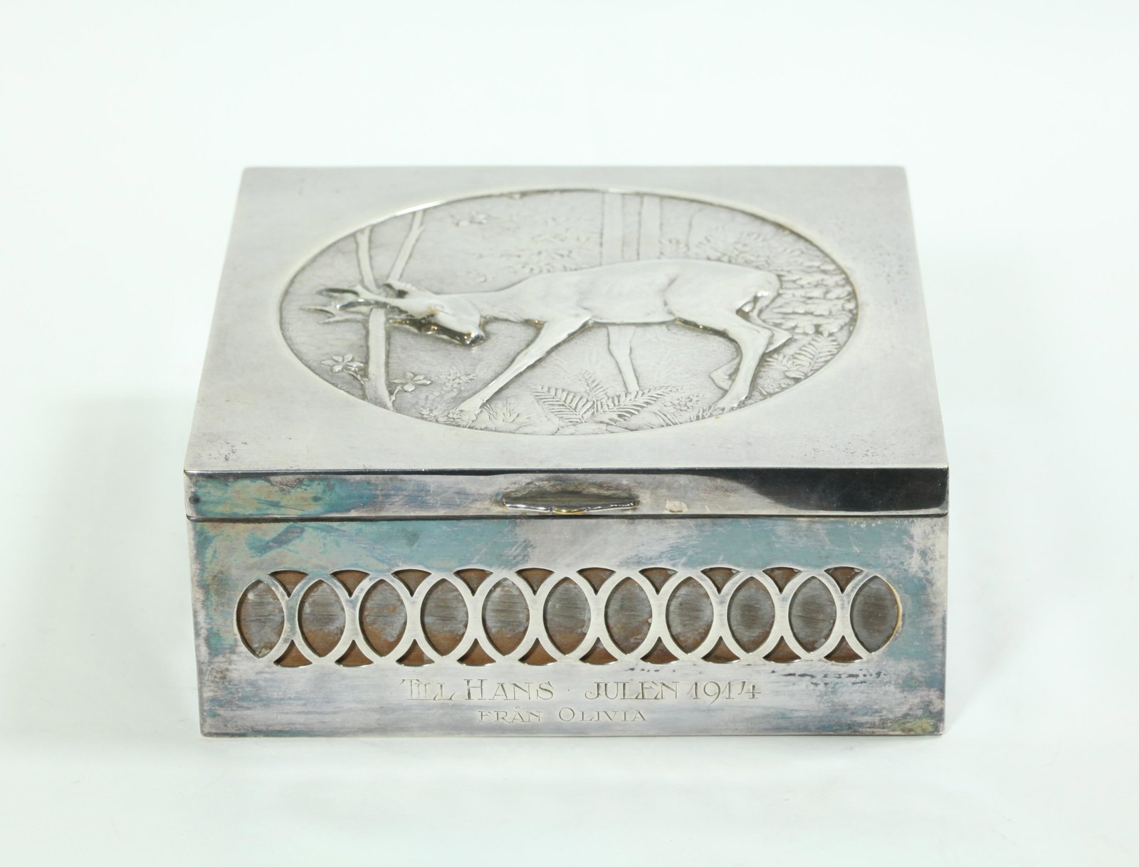 Deer Design Swedish Silver Cigar Humidor 1914: Swedish Silver Cigar or Tobacco Humidor, the top with a round design of a Deer Sharpening his Horns on Trees, inscribed in Swedish "Till Hans - Julen 1914 / Fran Olivia" (To Hans - Christmas 1914 / Fr