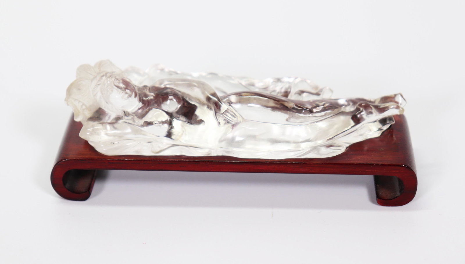 Wallace Chan Chinese Rock Crystal Lady Sculpture: Wallace Chan; Chinese near flawless Quartz Rock Crystal Reclining Nude Lady Sculpture, signed to the back edge "Wallace Chan"; now on a hardwood stand. Length of rock crystal 4 1/2 inches (11.5 cm.).