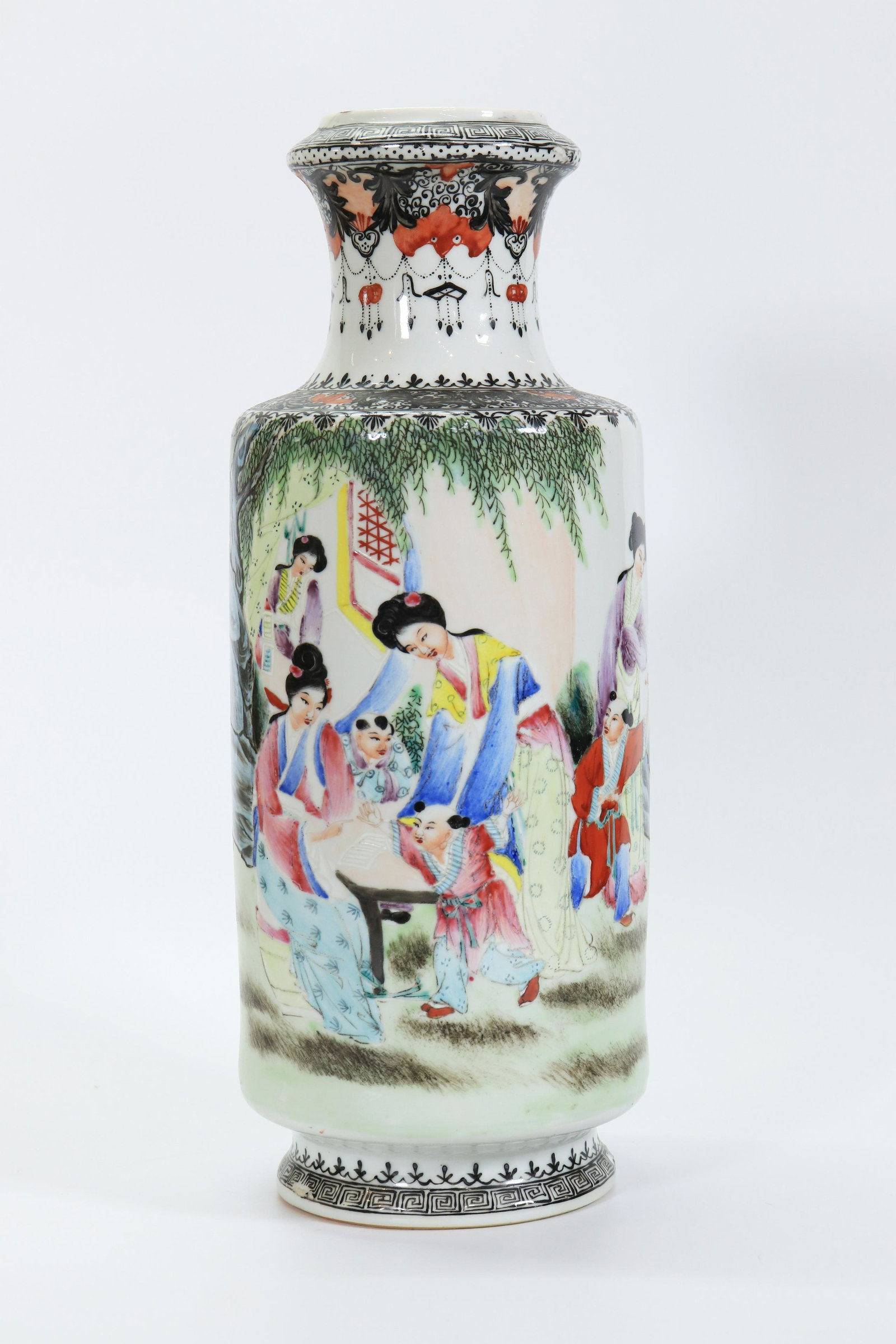 Chinese Enameled Porcelain Vase Ladies & Children: Chinese Famille Rose Enameled Porcelain Vase with a design of Ladies & Children, the reverse and base with seal ,marks, the mouth and shoulders with black & iron red embroidery designs. Height 13 1/4 