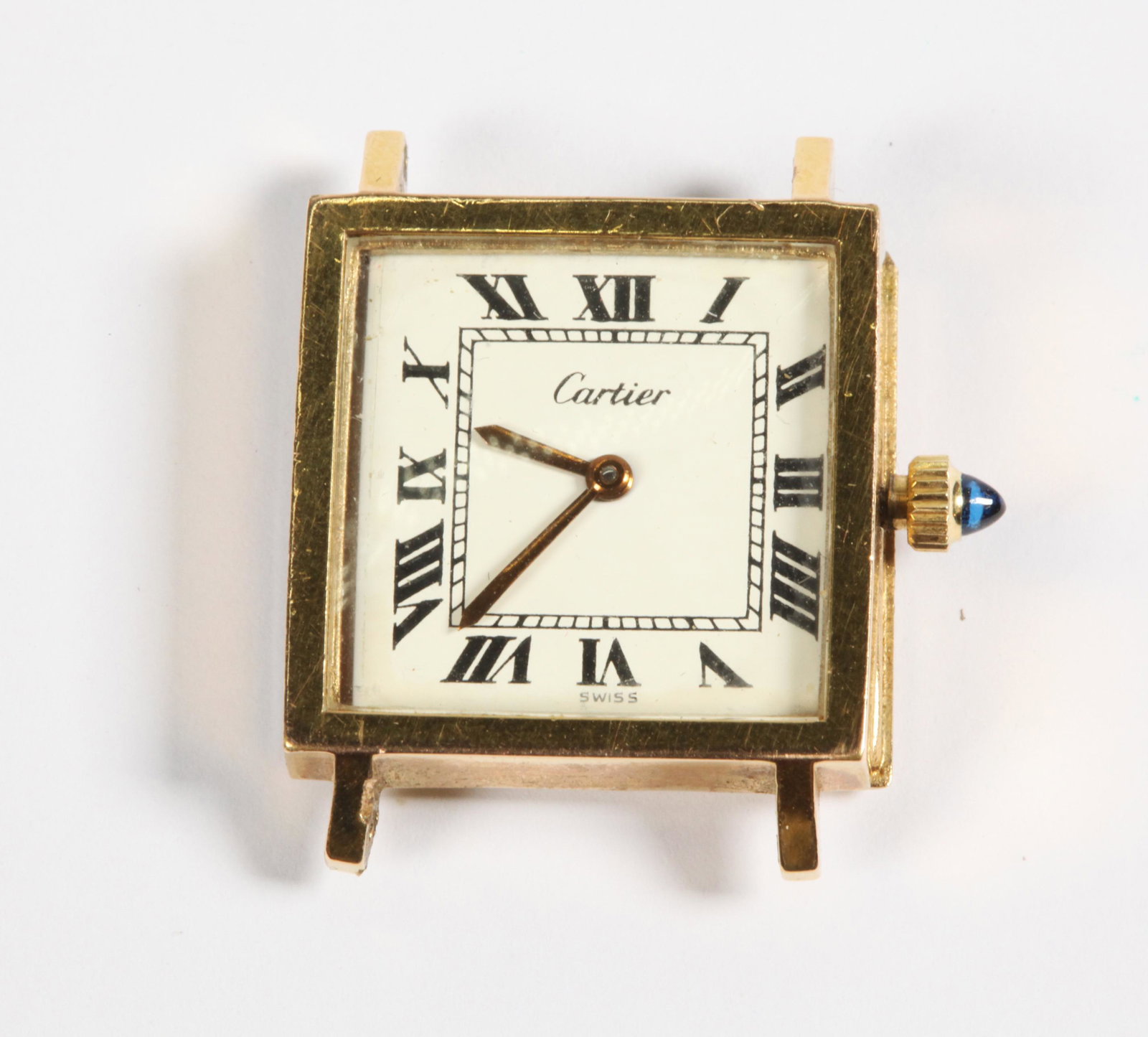"Cartier" 7/8 Inch Square Manual Watch Gold Plated: "Cartier" 7/8 Inch Square Manual Watch Gold Plated, the face with Roman Numerals, back of movement marked "CARTIER," sapphire type winder.