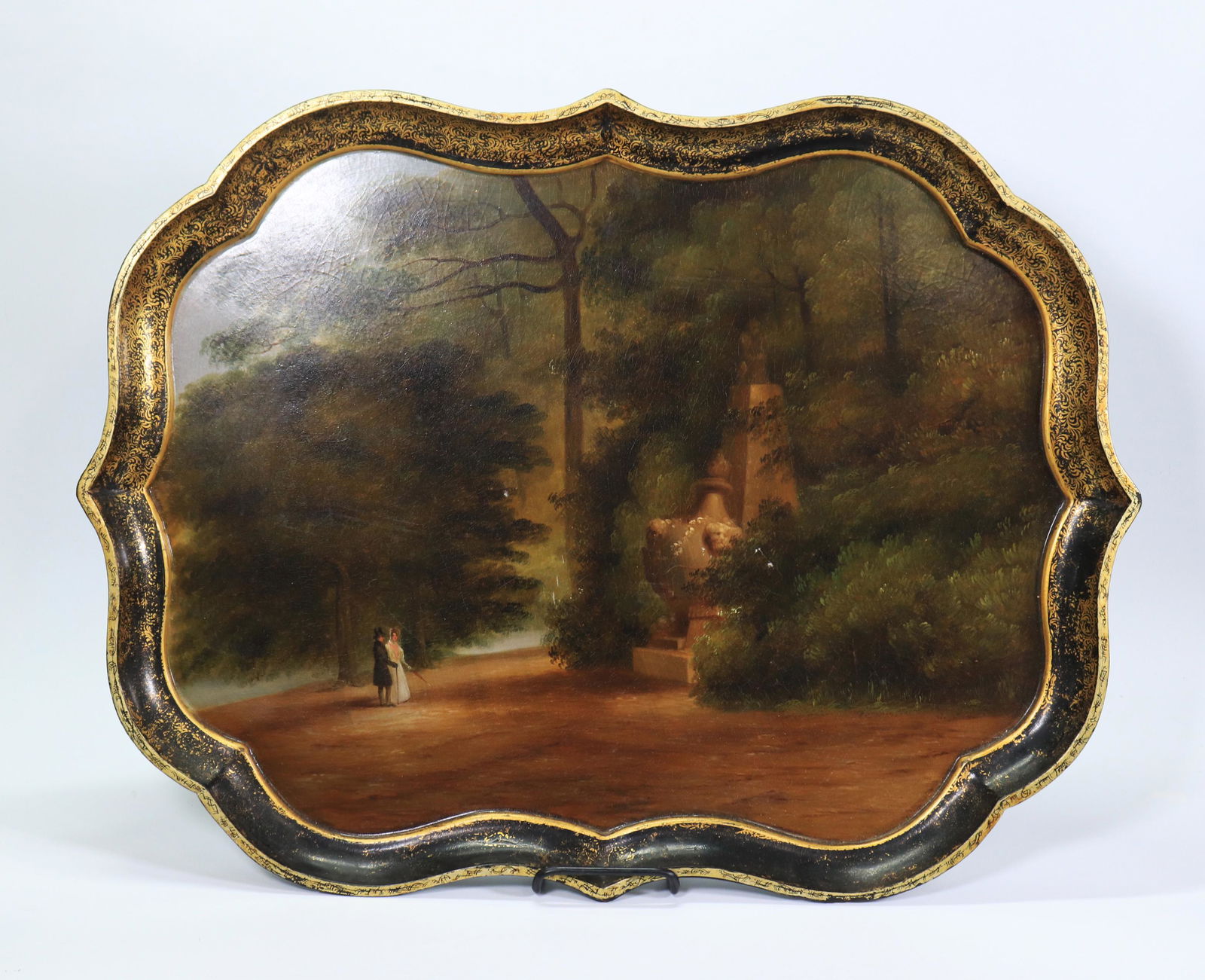 British Papier Mache Tray Congreve Monument Stowe: Fine British Papier Mache Tray circa 1830 with an oil painting to center of Congreave's Monument on the Grounds of the Stowe School, surrounded by a black border with the remains of a heavily scrolled