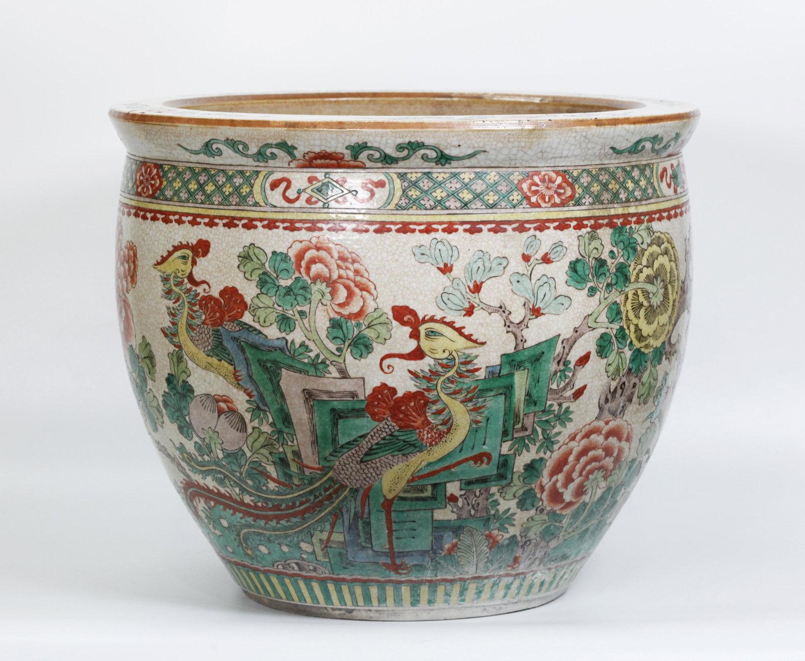 Chinese Verte Enamel Crackle Porcelain Fish Bowl: Chinese Verte Enamel Crackle Porcelain Fish Bowl with a design of 2 Phoenix Birds with Garden Rocks and 2 Green & Yellow in the sky, Birds with Peonies and Magnolia Branches, unglazed solid base and b
