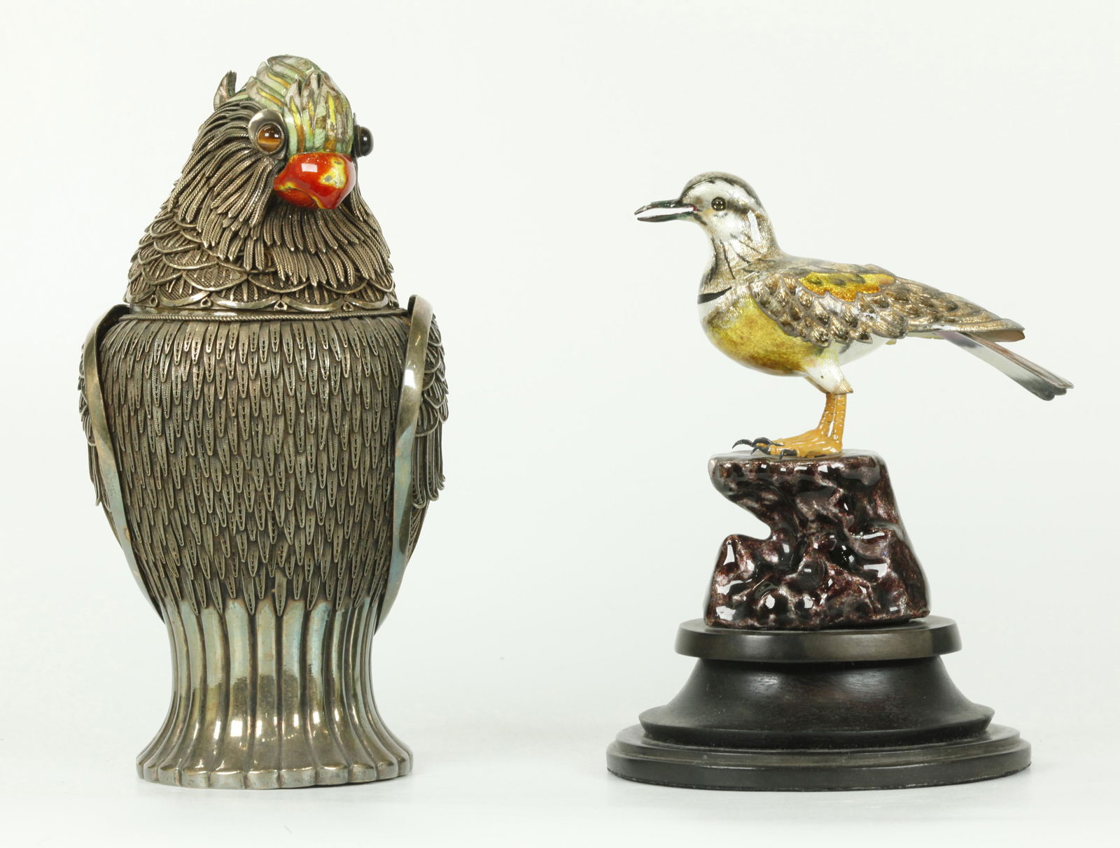 Chinese Silver & Wire-work Parrot; Enameled Bird: Chinese Silver & Wire-work Parrot or Cockatoo with tiger eye cabochons to eyes, enamel to beak & crest, gilt inside and marked SILVER to base; together with a Bird on wood-shaped base, Enameled over s