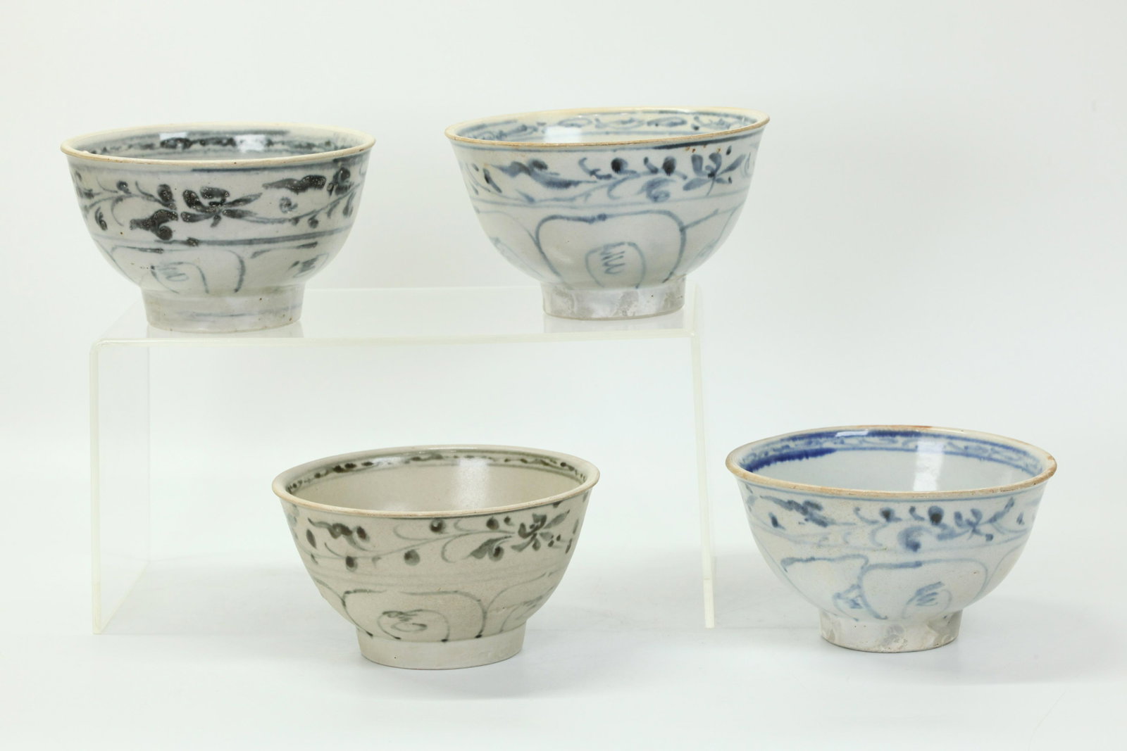 4 Hoi An Hoard 15th C Vietnamese Porcelain Bowls: 4 "Hoi An Hoard," Vietnamese late 15th Century Blue & White Porcelain Bowls each with numbered Auction label and corresponding numbered Bar Code. Diameter 5 1/2 inches (14 cm.). PROVENANCE: Discovered
