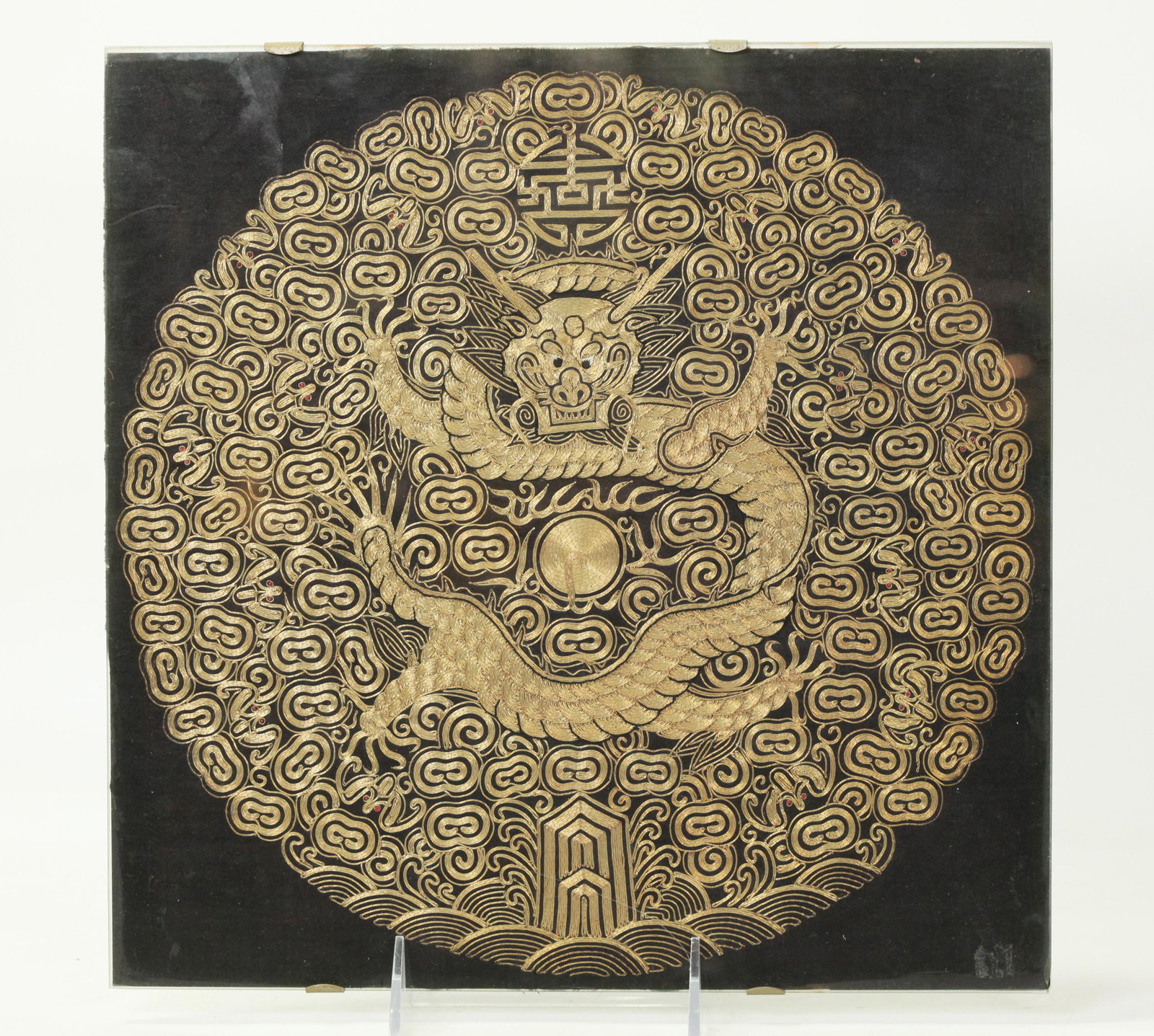 Chinese Qing Gold Thread Dragon Embroidery: Chinese Qing Dynasty laid Gold-wrapped Thread 5-claw Dragon Embroidery on cut black ground for applique with bats & clouds and a center of the Flaming Pearl over Waves with "Shou"; now between 2 sheet