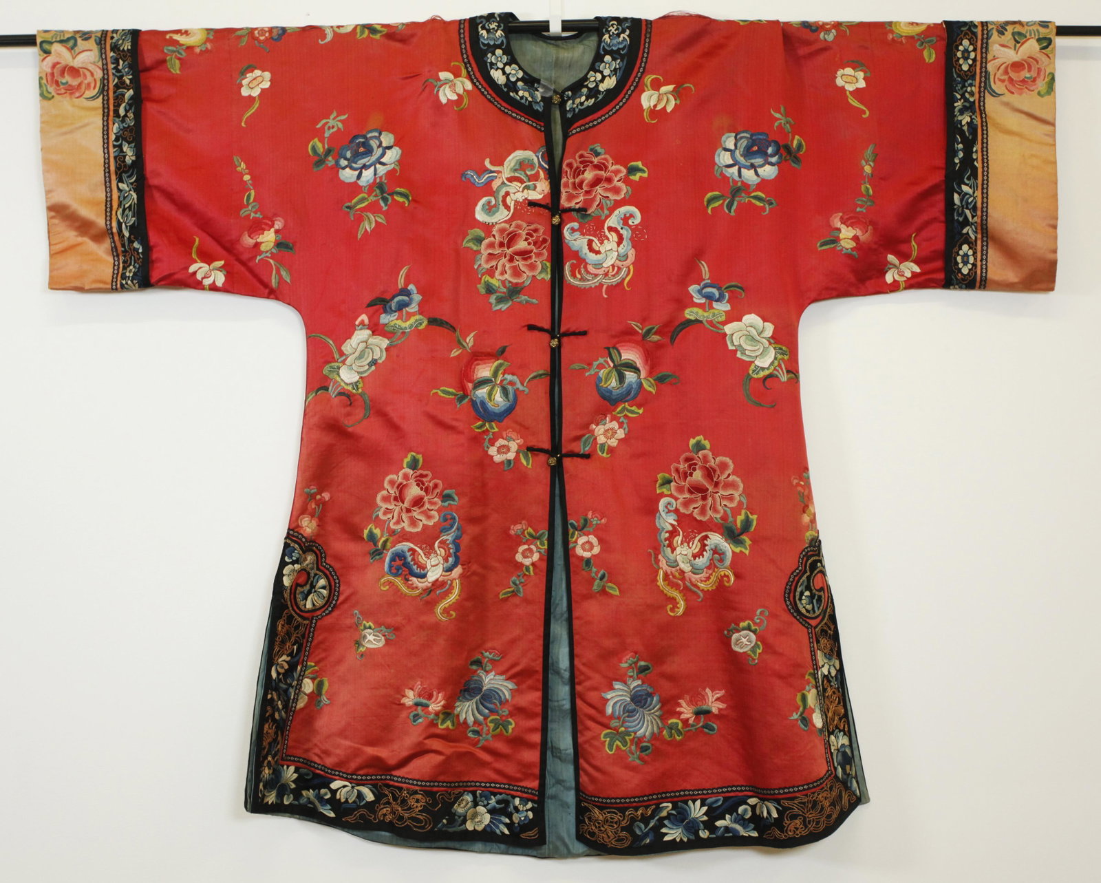 Chinese Qing Embroidered Peony Pink Silk 3/4 Coat: Chinese Qing Dynasty Embroidered Peony Pink Silk 3/4 Length Coat with a design of Peonies in Peking Knot embroidery and other flowers, fruit and butterflies in satin stitch embroidery with gilt bronze