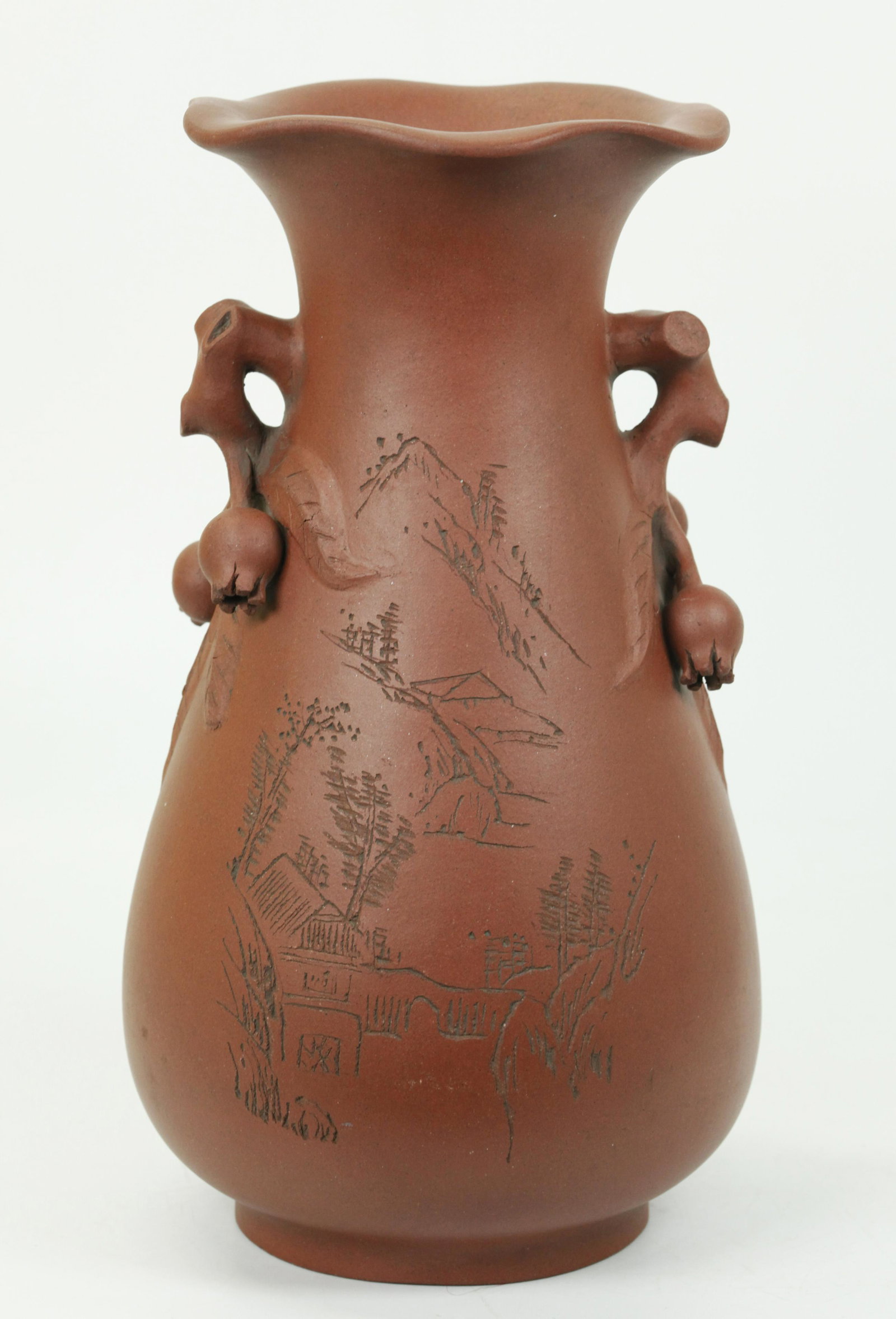 Chinese Yixing Vase Pomegranate Branch Handles: Chinese Yixing Vase with applied Pomegranate Branch Handles to the neck and a flared wavy mouth edge, the front incised with a Landscape and the reverse with Calligraphy, seal mark to base. Height 10 