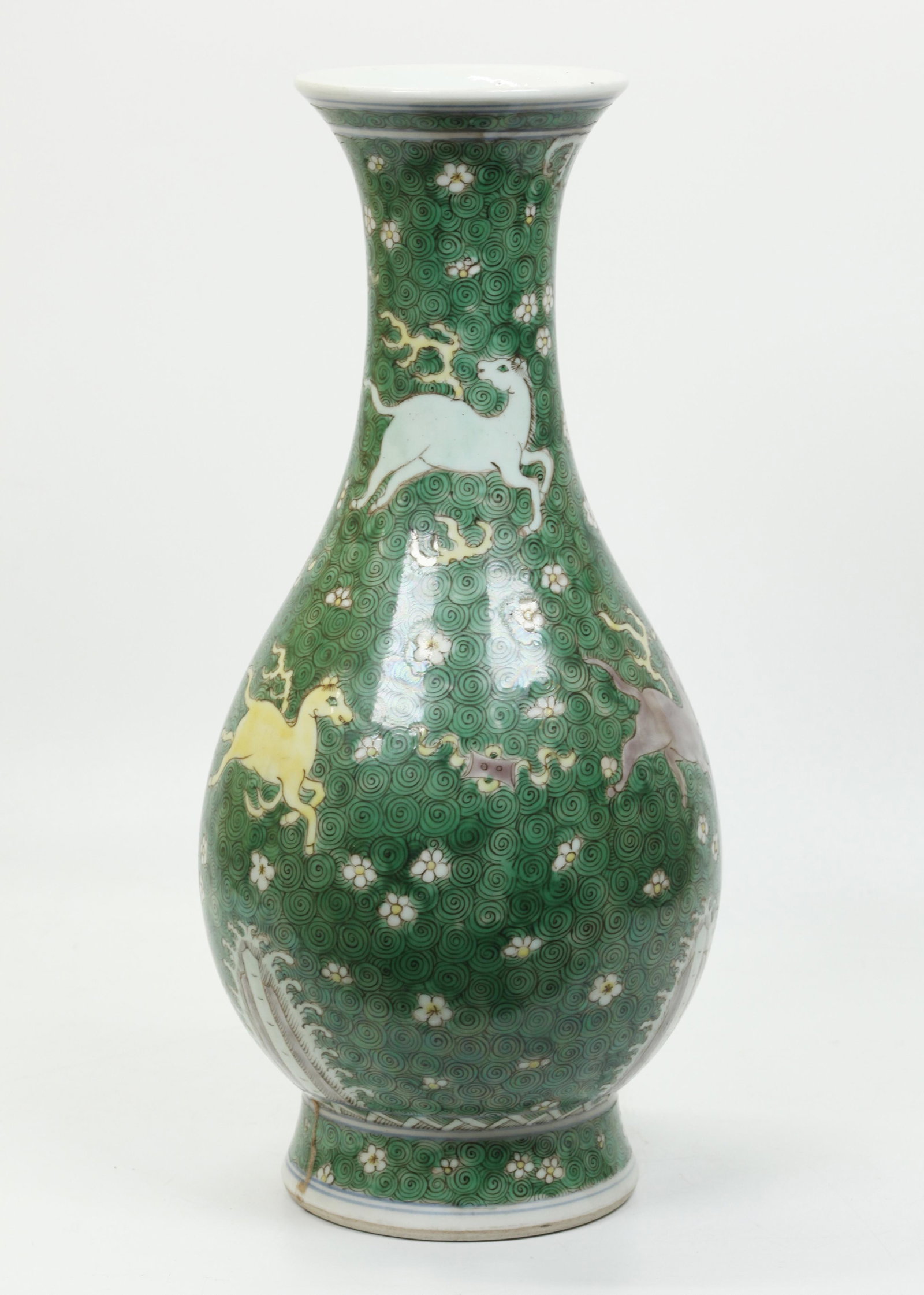 Chinese Enameled Porcelain Vase, Horses in Clouds: Chinese Enameled Porcelain Vase with a design of Flying Horses with Flames in Green Clouds with white Blossoms, the base with a Double Fish mark inside double rings all in underglaze blue on a clear g