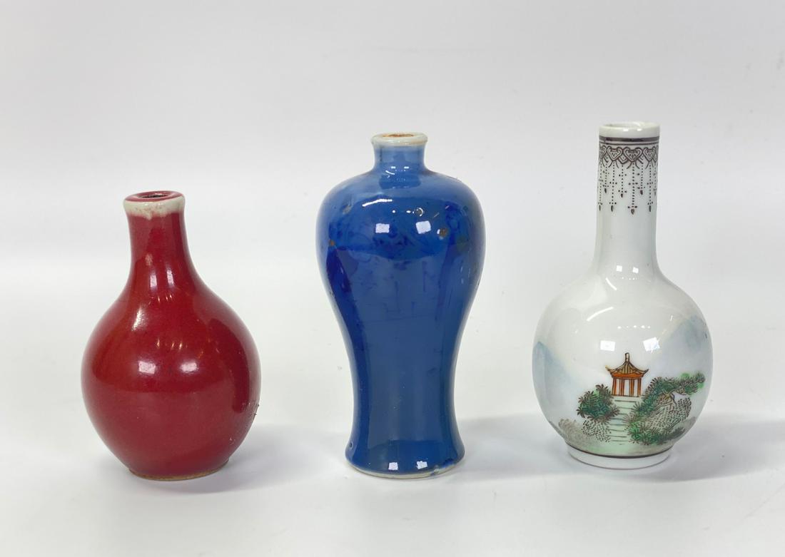 ewter with3 Chinese Miniature Porcelain Bottles: 3 Chinse Miniature Porcelain Bottles: an underglaze blue meiping with darker blue figures probably Qing Dynasty with blue glazed base and white mouth now used as a snuff bottle; together with an under