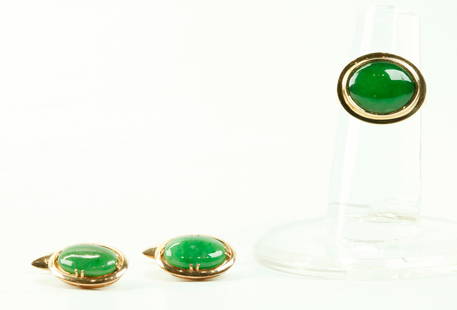 3 Chinese Natural Jadeites: 18K Cuff Links 14K Ring: 3 Chinese Natural Jadeites: a Pair Vintage Chinese Green Natural Jadeite oval cabochons mounted as cuff links in yellow gold marked "18K" to settings and toggles; together with an oval cabochon emeral