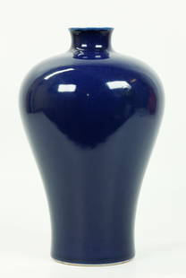 Chinese Monochrome Blue Porcelain Meiping Vase: Chinese Monochrome Blue Porcelain Meiping Vase forming a clean white line at the mouth with a clear glaze inside and to base with a 6 character Qianlong Seal mark to base in underglaze blue. Height 8