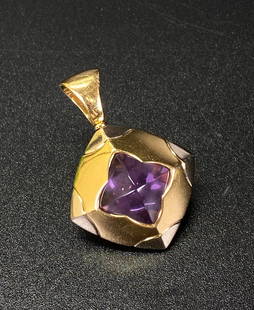 Bulgari 18K Yellow Gold Amethyst Pyramid Pendant: Bulgari 18K Yellow Gold Pyramid Pendant with swivel suspension loop with a "Sugar Loaf" Cabochon Amethyst to center; marked "Bvlgari / 750" to reverse. Total weight 14.8 grams. Total height 1 3/4 inch