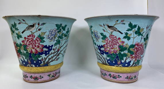 Lg Pair Chinese Enameled Porcelain Planters: Large Pair Chinese Enameled Porcelain Flared Planters with birds, garden rocks and flowering branches on a pale turquoise ground over a yellow band and pink band at foot, the unglazed bases with