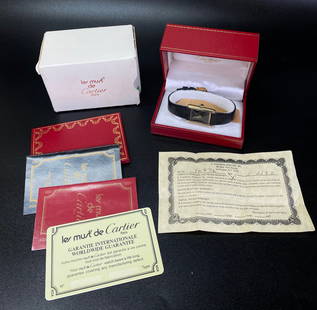 Le Must de Cartier Vintage Tank Watch Lizzard Band: Le Must de Cartier; Vintage Tank Watch in heavy gold plated sterling marked "925" to back of watch; with black Lizzard Band marked "Tiffany & Co" in original red presentation box, cardboard outer box,