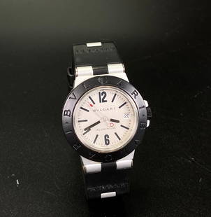 Bulgari Aluminum Watch with Strap: Bulgari Aluminum Watch with adjustable Strap. Diameter of case 1 5/8 inches (4.2 cm.).