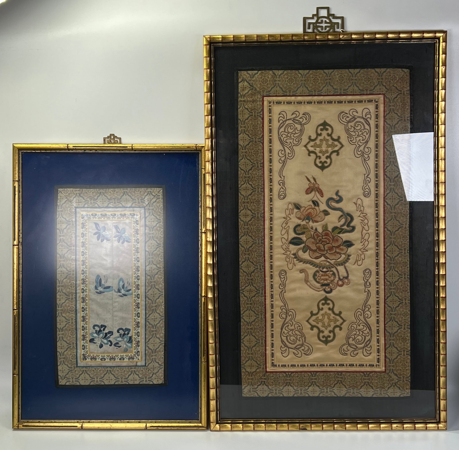 2 Chinese Qing Dynasty Silk Embroideries: 2 Chinese Qing Dynasty Silk Embroideries with ribbon and brocade borders now mounted on fabric and framed to edges of fabric borders: the larger a panel of a satin stitch and Peking Knot Flower Basket