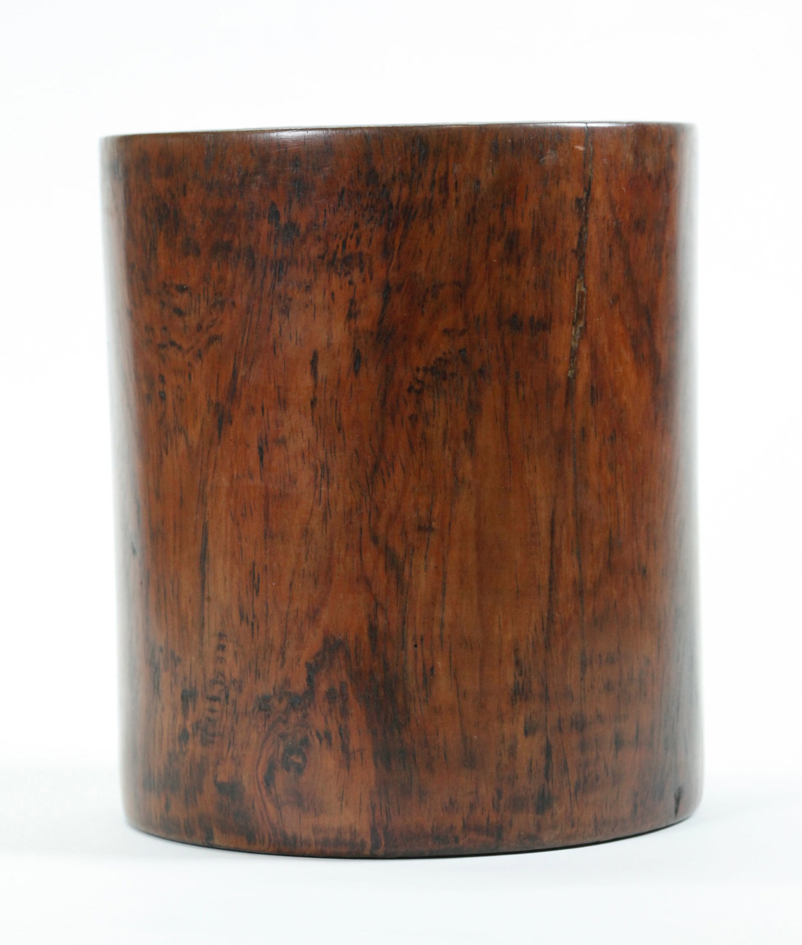 Bonham's; Chinese Huanghuali Brush Pot: Chinese Huanghuali Brush Pot with a softwood plug to wide base and a light taper to the sides. Height 5 1/2 inches (14 cm.). PROVENANCE: Bonham's Auction with old bar code label; to the private collec