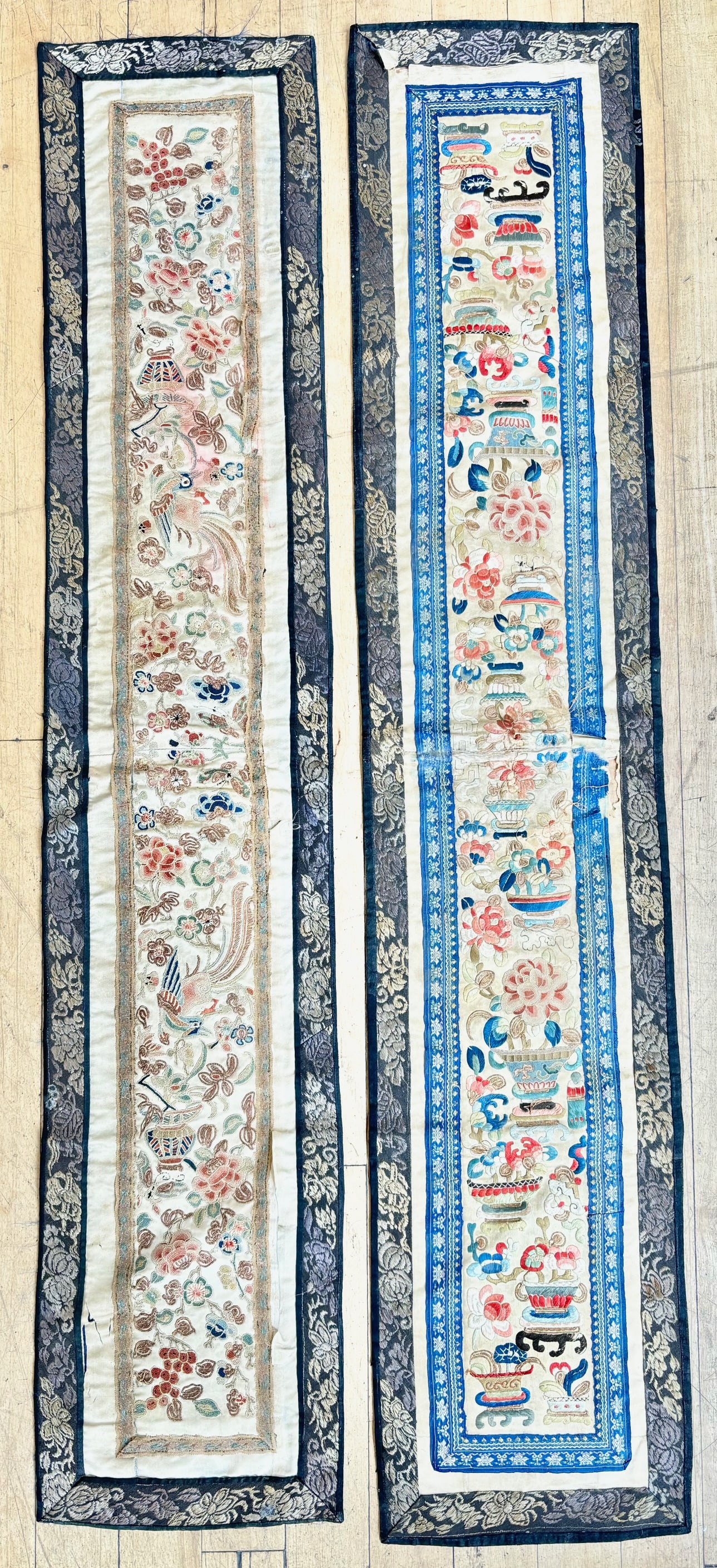2 Pairs Chinese 19th C Embroidered Sleeve Borders: 2 Pairs Chinese 19th C Embroidered Sleeve Borders each sewn together at short ends to form long panels; 1 with Peking Knot and laid gold wrapped thread designs of Birds, Baskets of Flowers and Grapes,